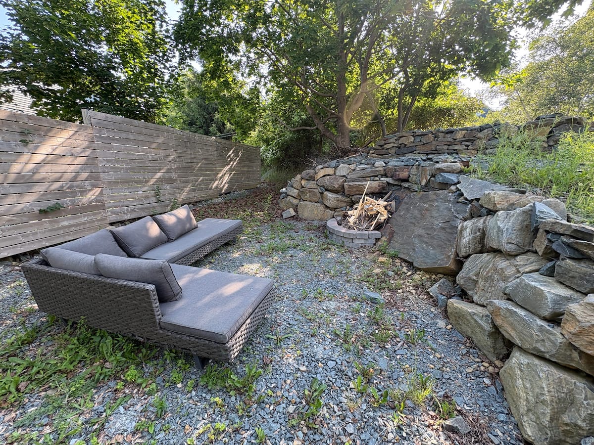 Outdoor firepit and stone seating area
