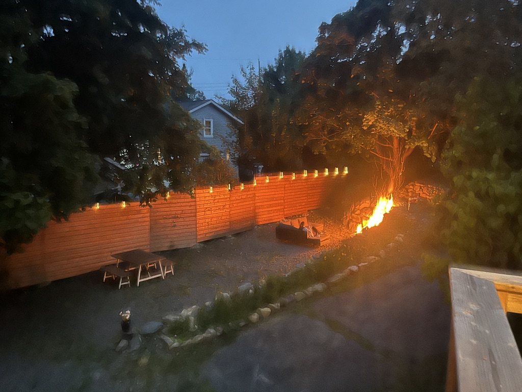 Outdoor firepit and stone seating area